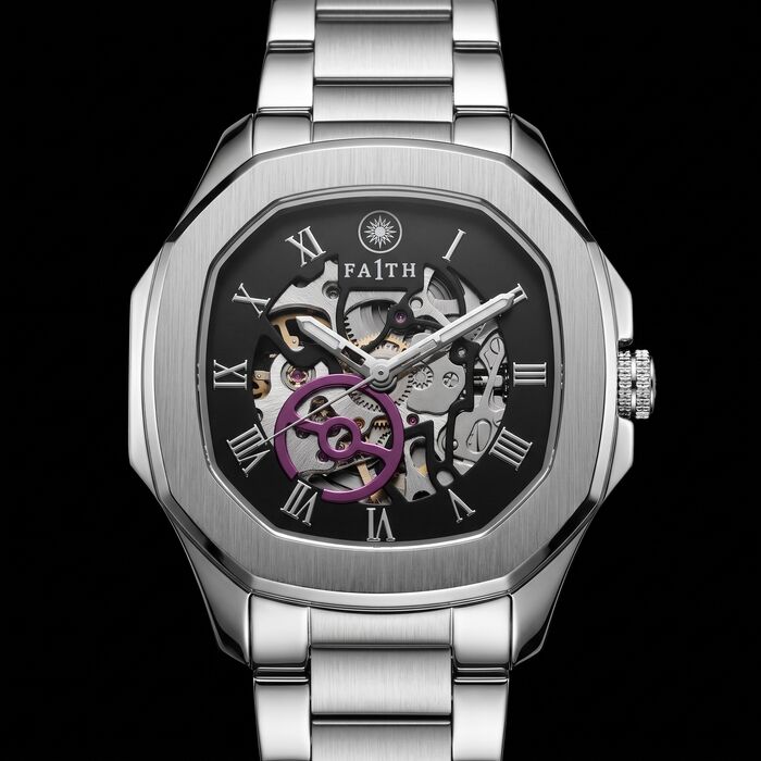 The 1 in brushed steel, skeleton dial, front view